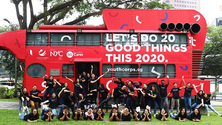 youth-corps-staff-red-bus-group-photo-720-405-D