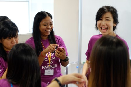 Sheila (center), together with the other volunteers, preparing for the parade